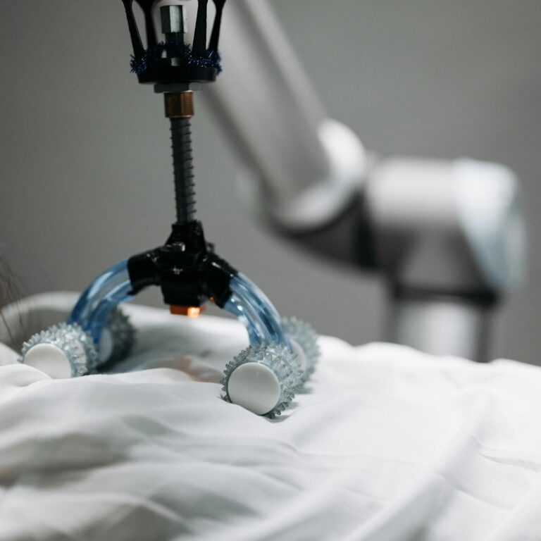 Close-up of a robotic massage arm applying therapy on a person, showcasing innovation.